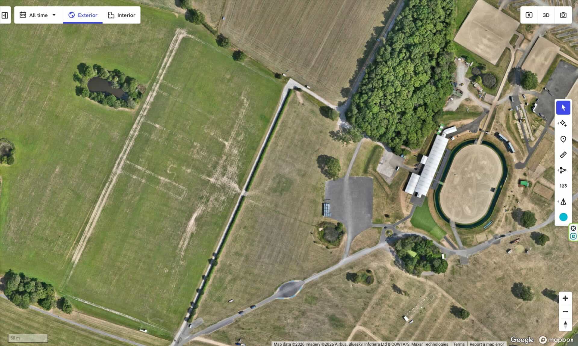 Aerial view of Bryant Site Services with sports fields and surrounding greenery.